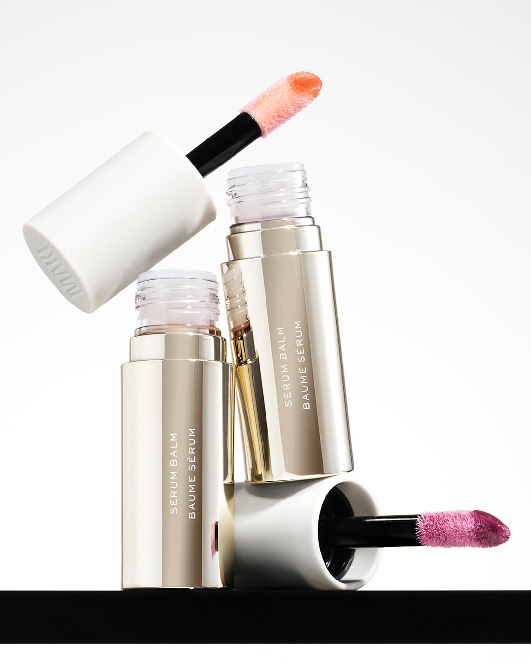 MAKE Beauty Serum Balm Hydrating Lip Oil. Vegan moisturizing lip gloss with plumping effect. Lip