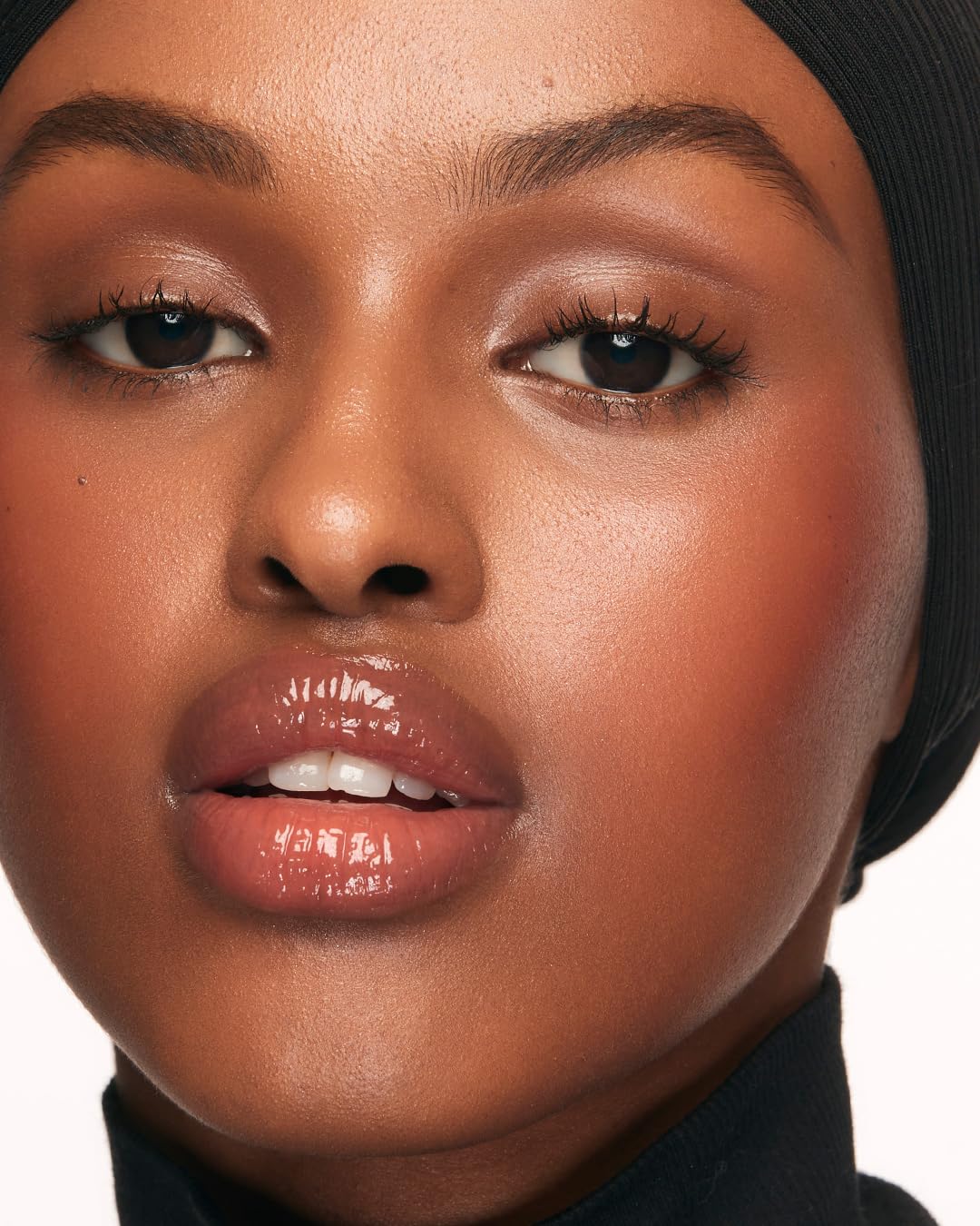 MAKE Beauty Serum Balm Hydrating Lip Oil. Vegan moisturizing lip gloss with plumping effect. Lip